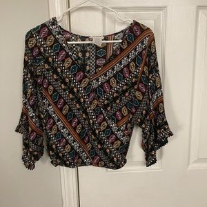 Size small, it’s  black with Multiple colors